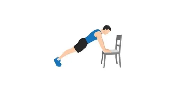 man doing inclined push ups