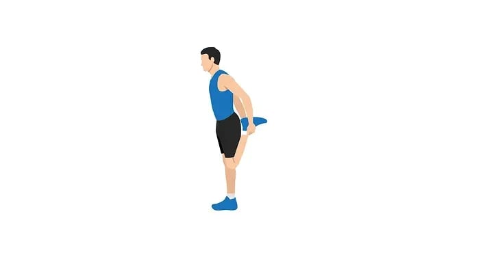 man doing standing quad stretch
